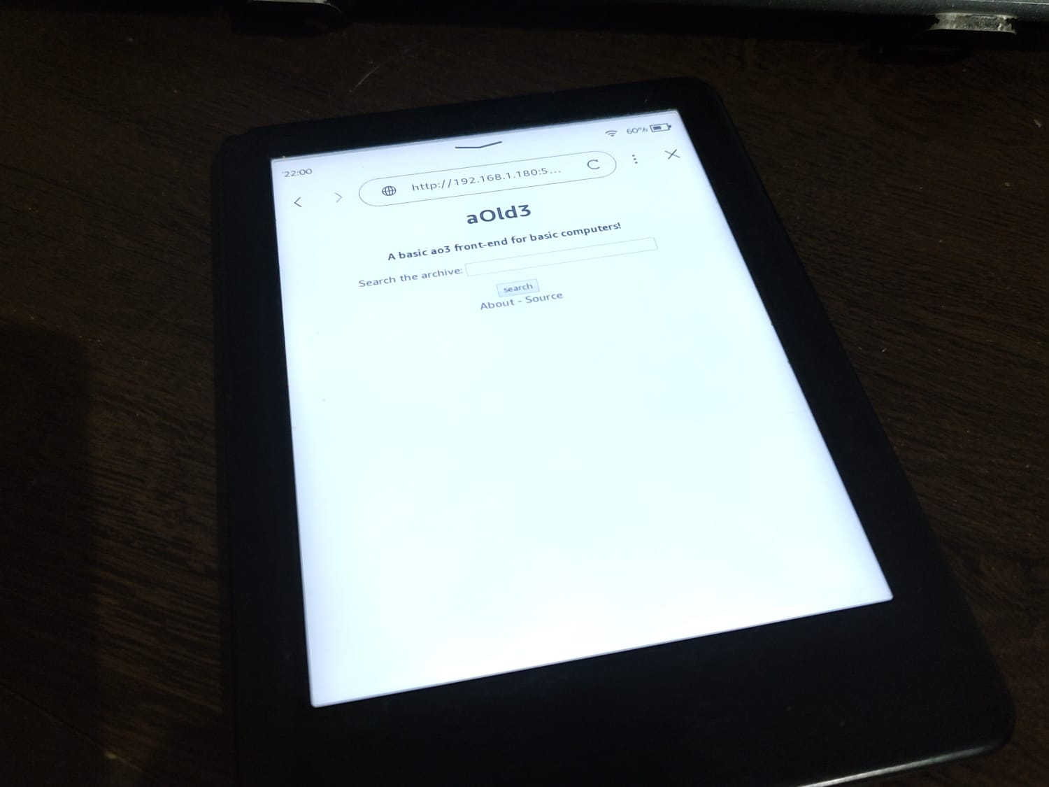 photo of aOld3 current homepage running on a kindle. just a searchbox and about and source links